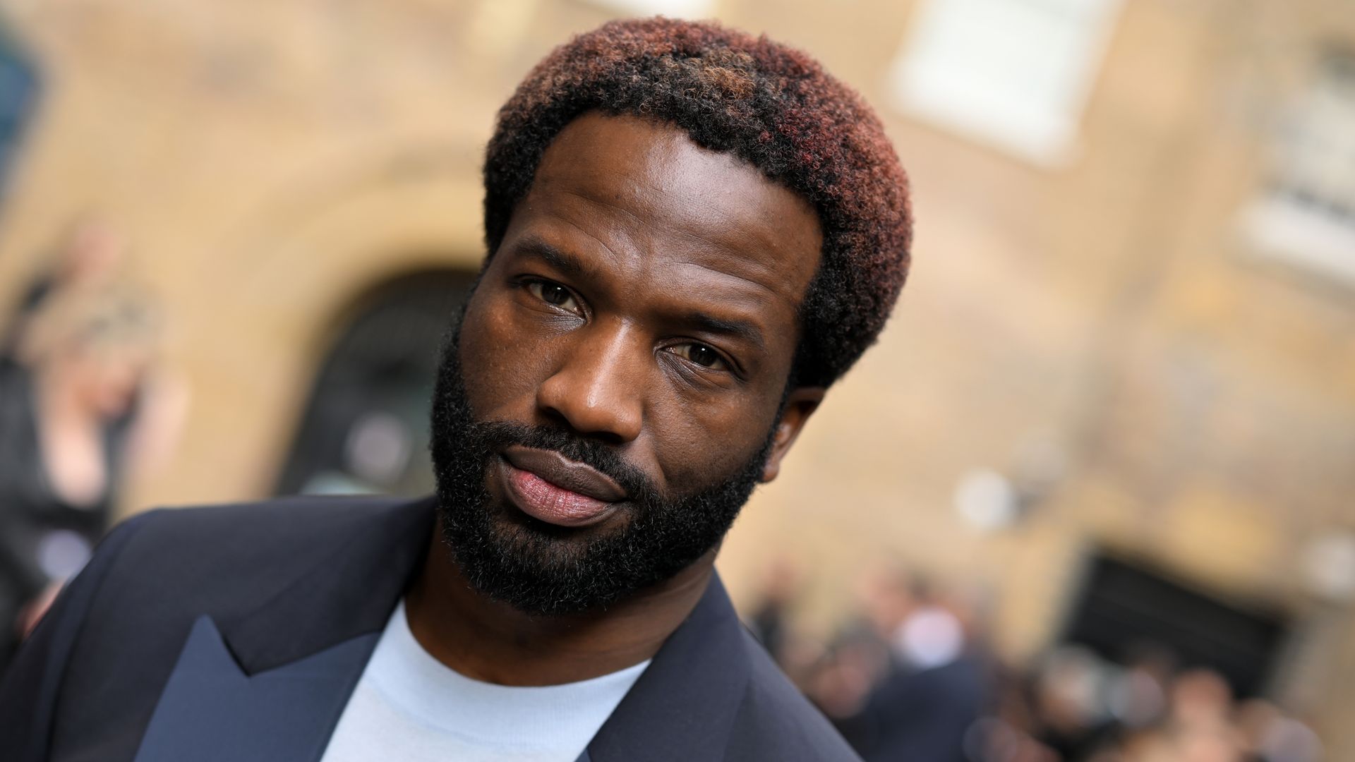 close-up man in navy suit