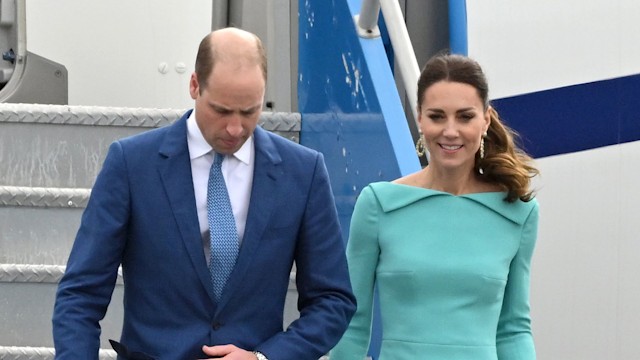 Prince William and Kate Middleton walk down plane steps