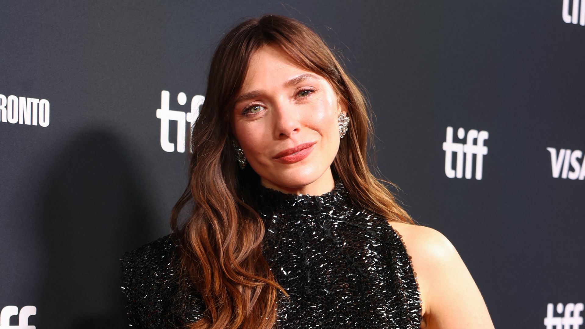 Elizabeth Olsen in black sequin dress at the world premiere of "Eternity" at the Roy Thompson during the Toronto International Film Festival
