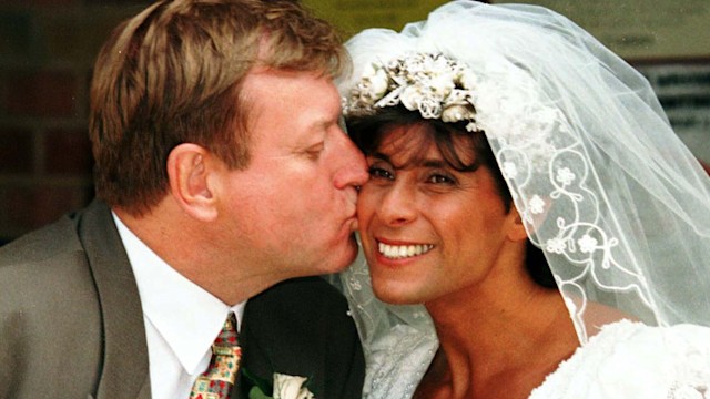 Fatima Whitbread's husband Andy Norman kisses his bride on their wedding day in 1997
