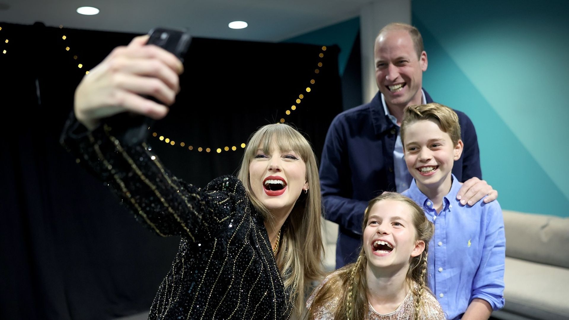 A photo of Prince George, Princess Charlotte, Prince William and Taylor Swift 