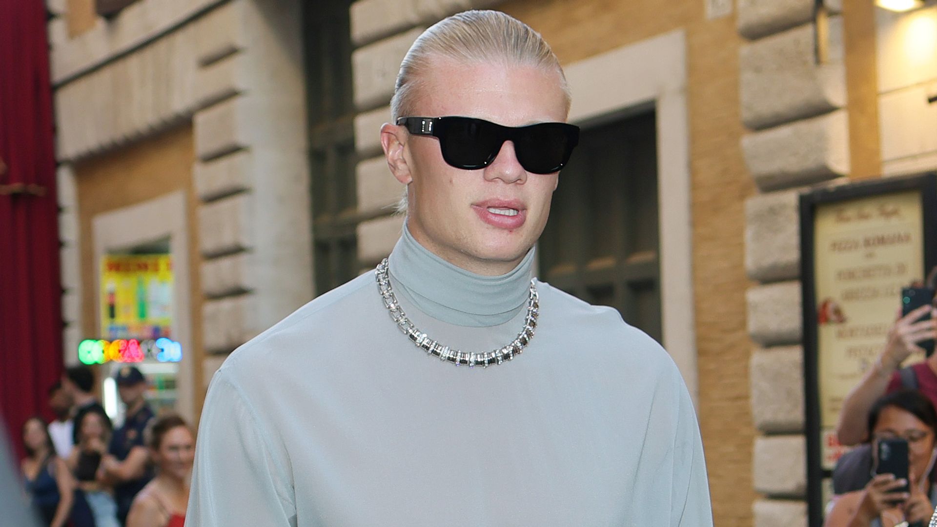 Erling Haaland and Isabel Haugseng Johansen are seen outside the Dolce & Gabbana Alta Sartoria fashion show at Castel Sant'Angelo on July 15, 2025 in Rome, 