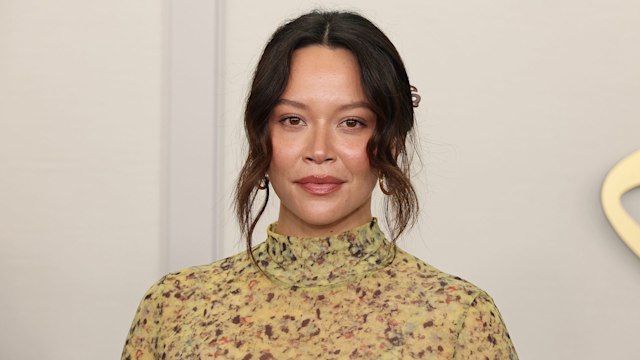 Melissa O'Neil wearing a yellow floral top