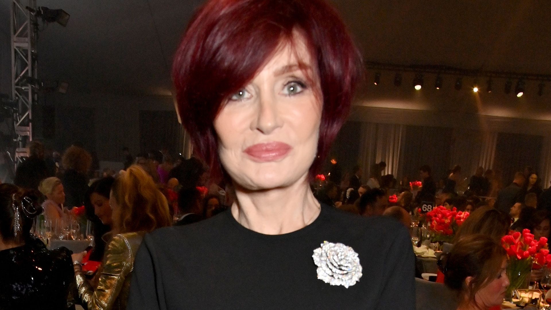 Sharon Osbourne wearing a black dress 