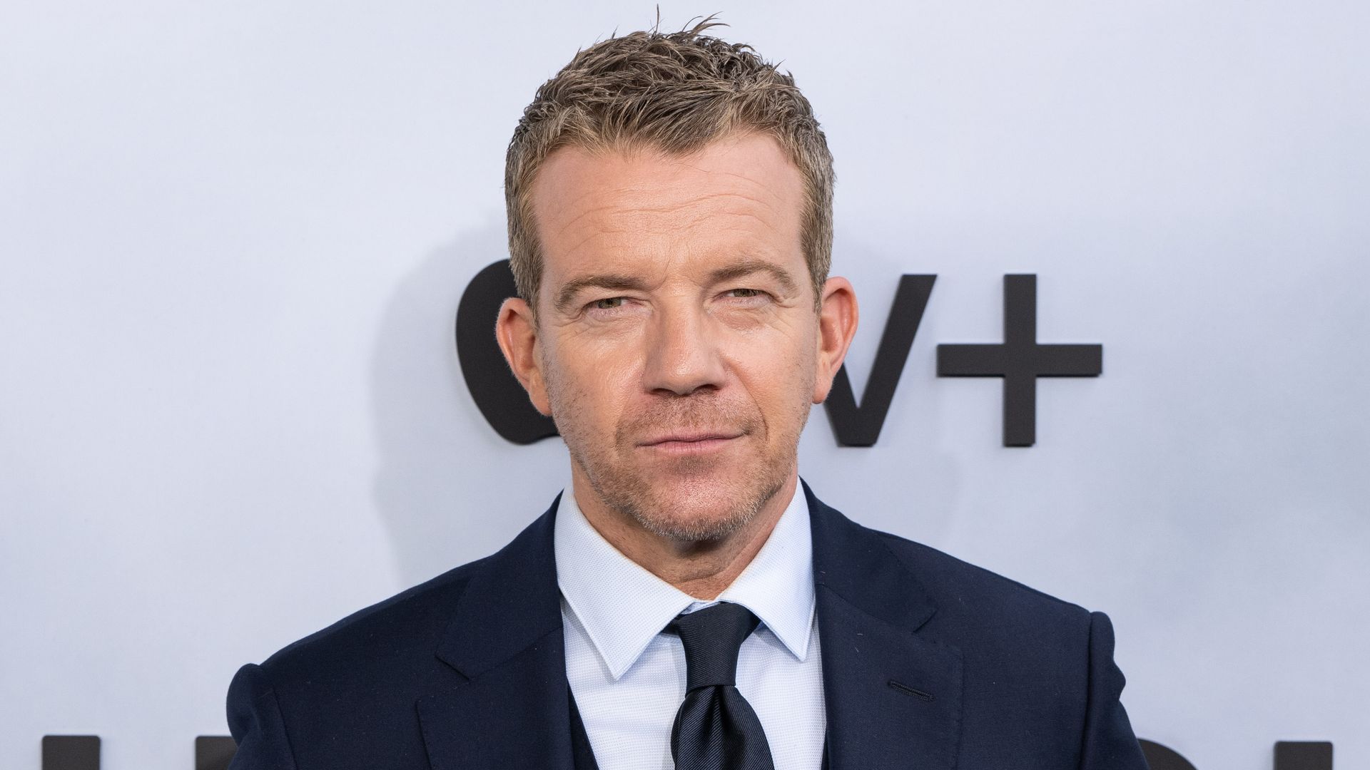 Max Beesley posing for photos at a premiere