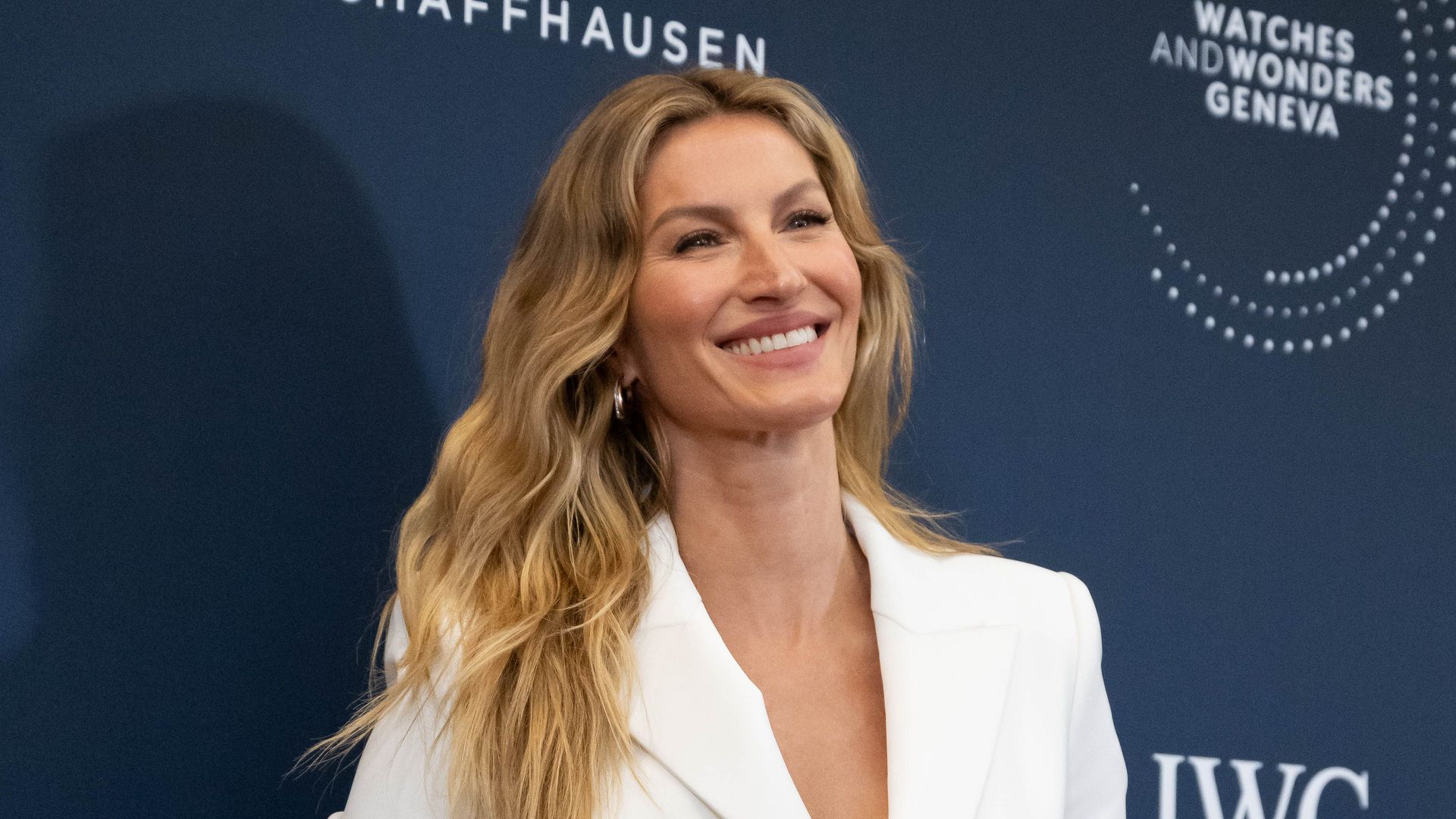 Gisele Bündchen reveals growing baby bump in rare video