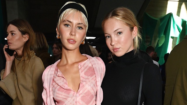 Iris Law and Lila Moss attend the Burberry Summer 2025 show during London Fashion Week