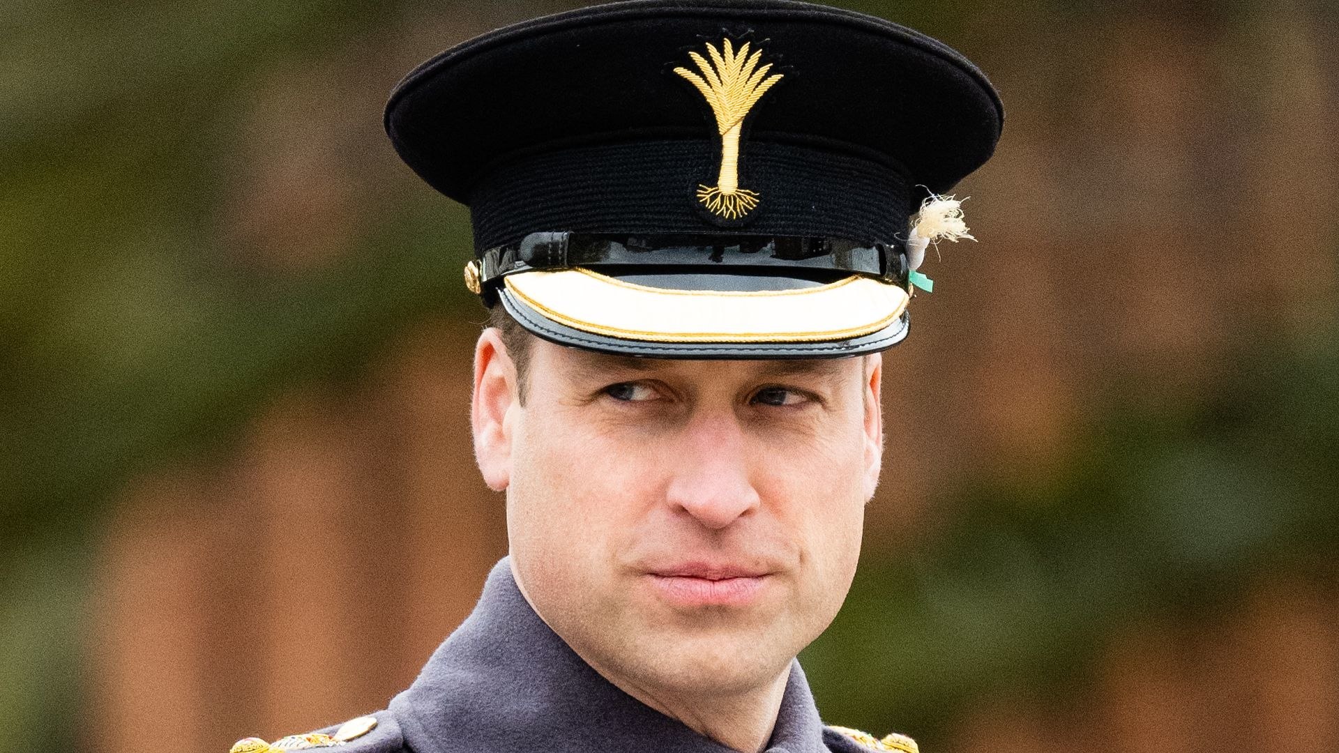Prince William in grey military uniform