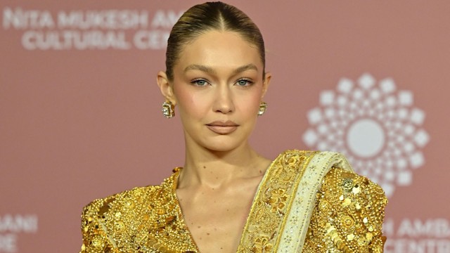 In this picture taken on April 1, 2023, US model Gigi Hadid poses for pictures during the inauguration of the Nita Mukesh Ambani Cultural Centre (NMACC) at the Jio World Centre (JWC) in Mumbai. (Photo by SUJIT JAISWAL / AFP) (Photo by SUJIT JAISWAL/AFP vi