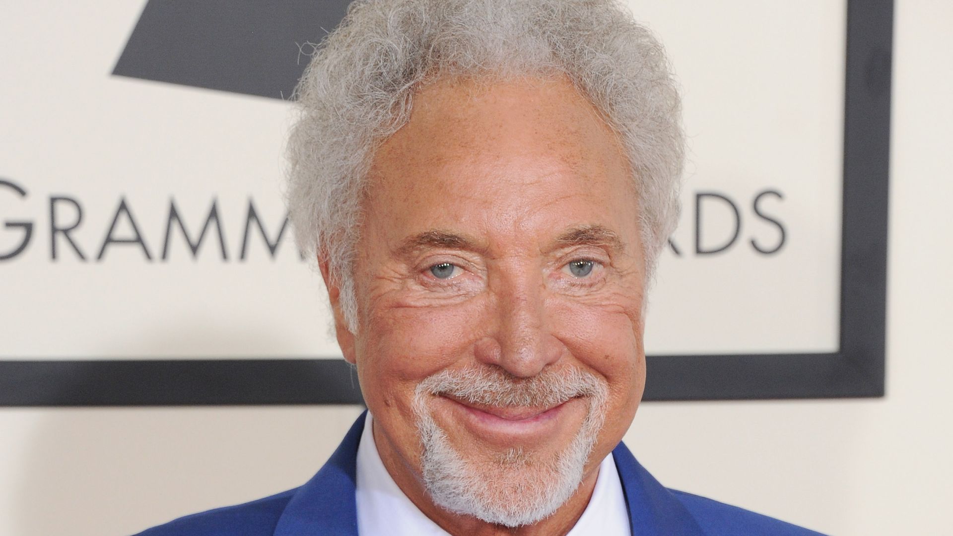 Tom Jones in a blue suit