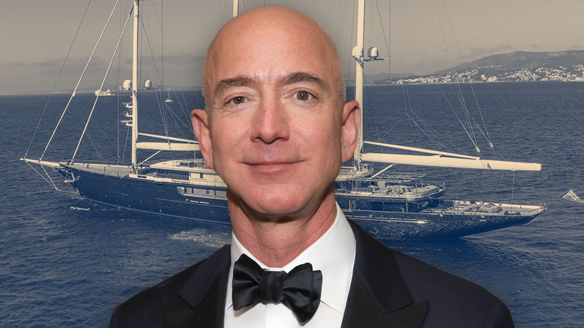 Jeff Bezos in a black tuxedo in the foreground and his Koru yacht in the background