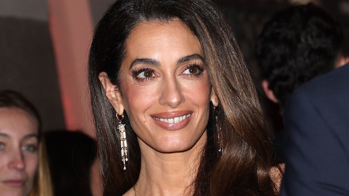 Amal Clooney is a vision in semi-sheer gown for glamorous date night at 2026 Olympics