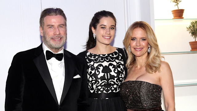 John Travolta and his wife Kelly Preston and daughter Ella Bleu Travolta (C) during the party in Honour of John Travolta's receipt of the Inaugural Variety Cinema Icon Award during the 71st annual Cannes Film Festival at Hotel du Cap-Eden-Roc on May 15, 2018