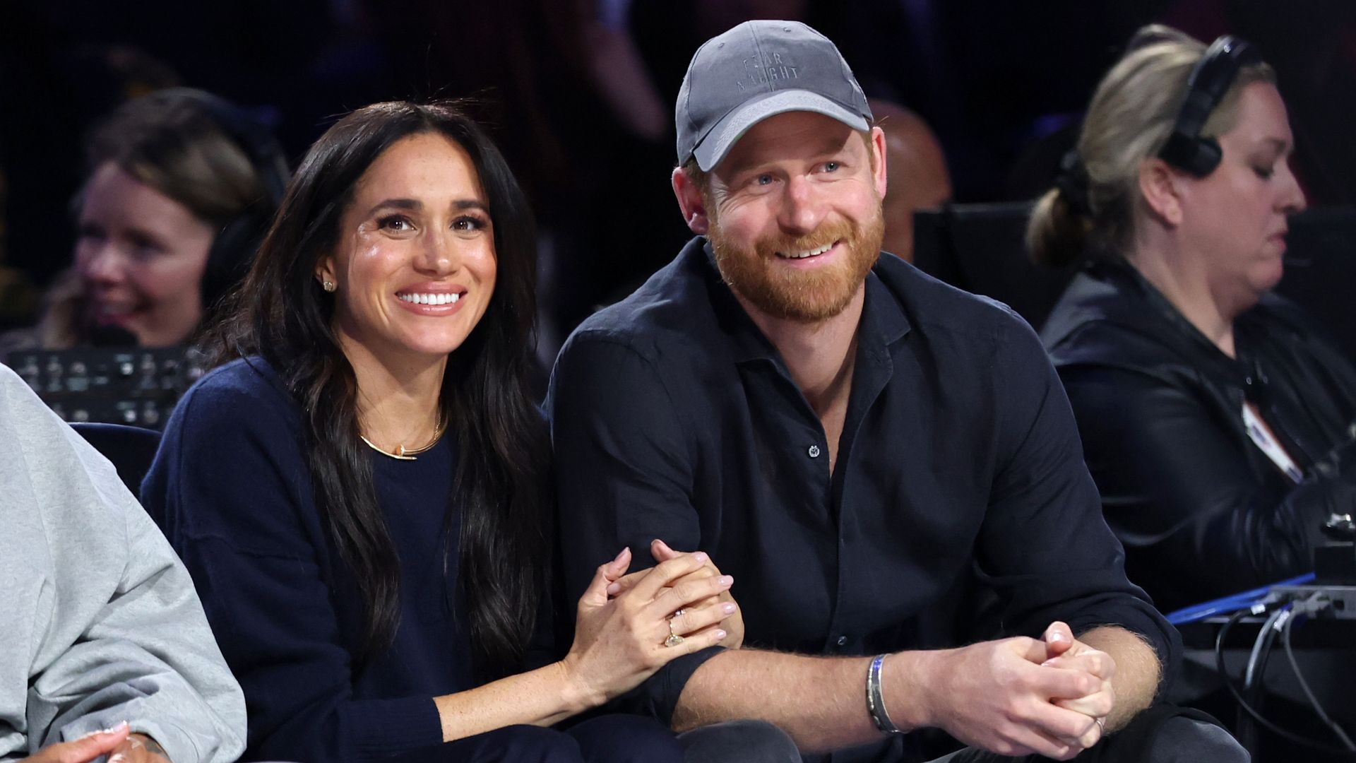Meghan Markle and Prince Harry enjoy loved-up date night courtside - see the incredible photos