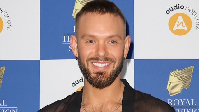 John Whaite attends the Royal Television Society Programme Awards at The Grosvenor House Hotel on March 29, 2022