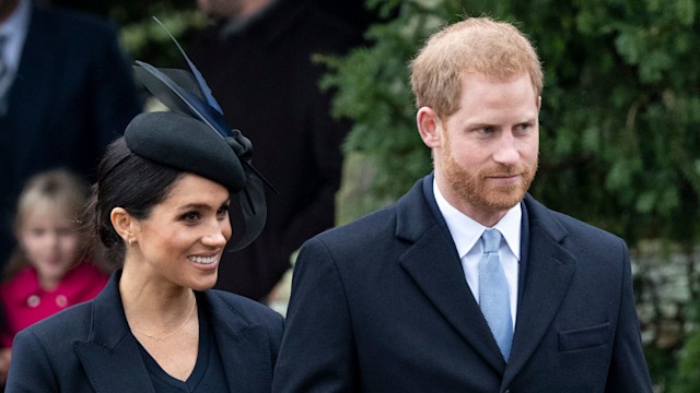 Prince Harry and Meghan Markle walking