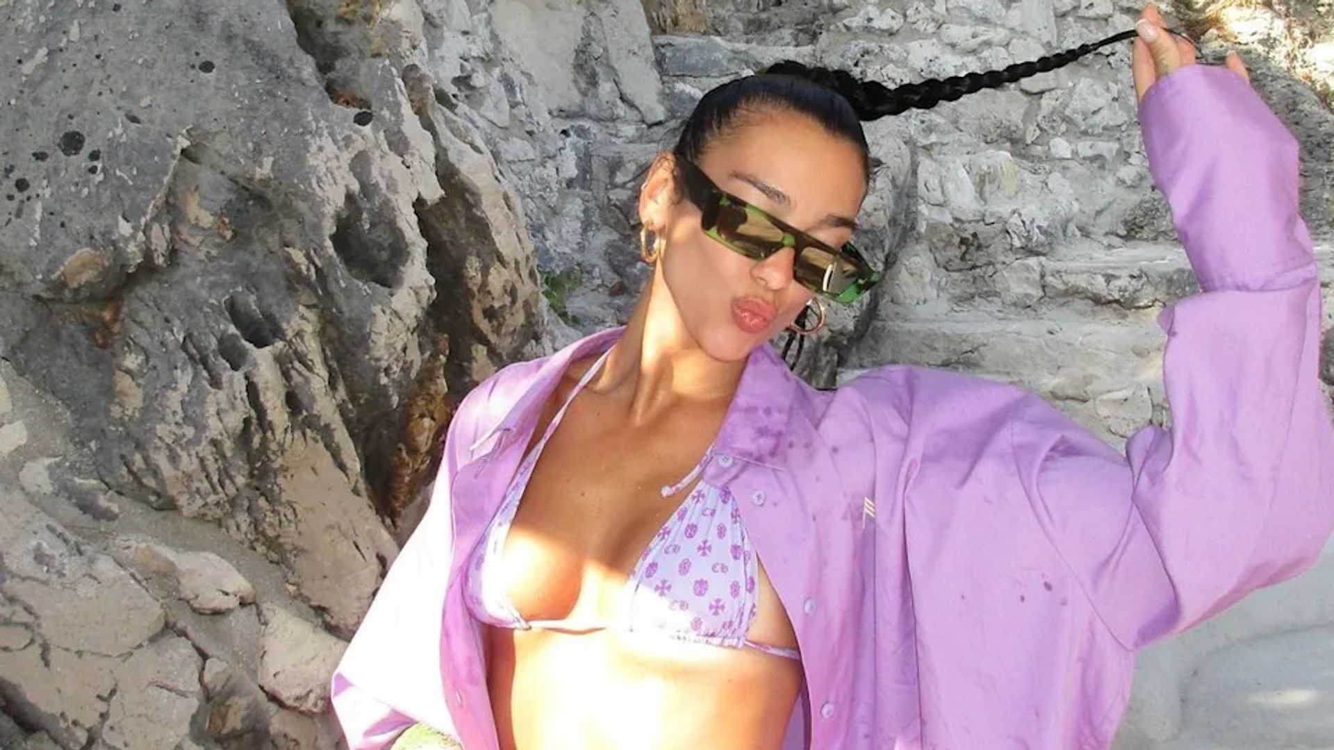 dua lipa in purple shirt