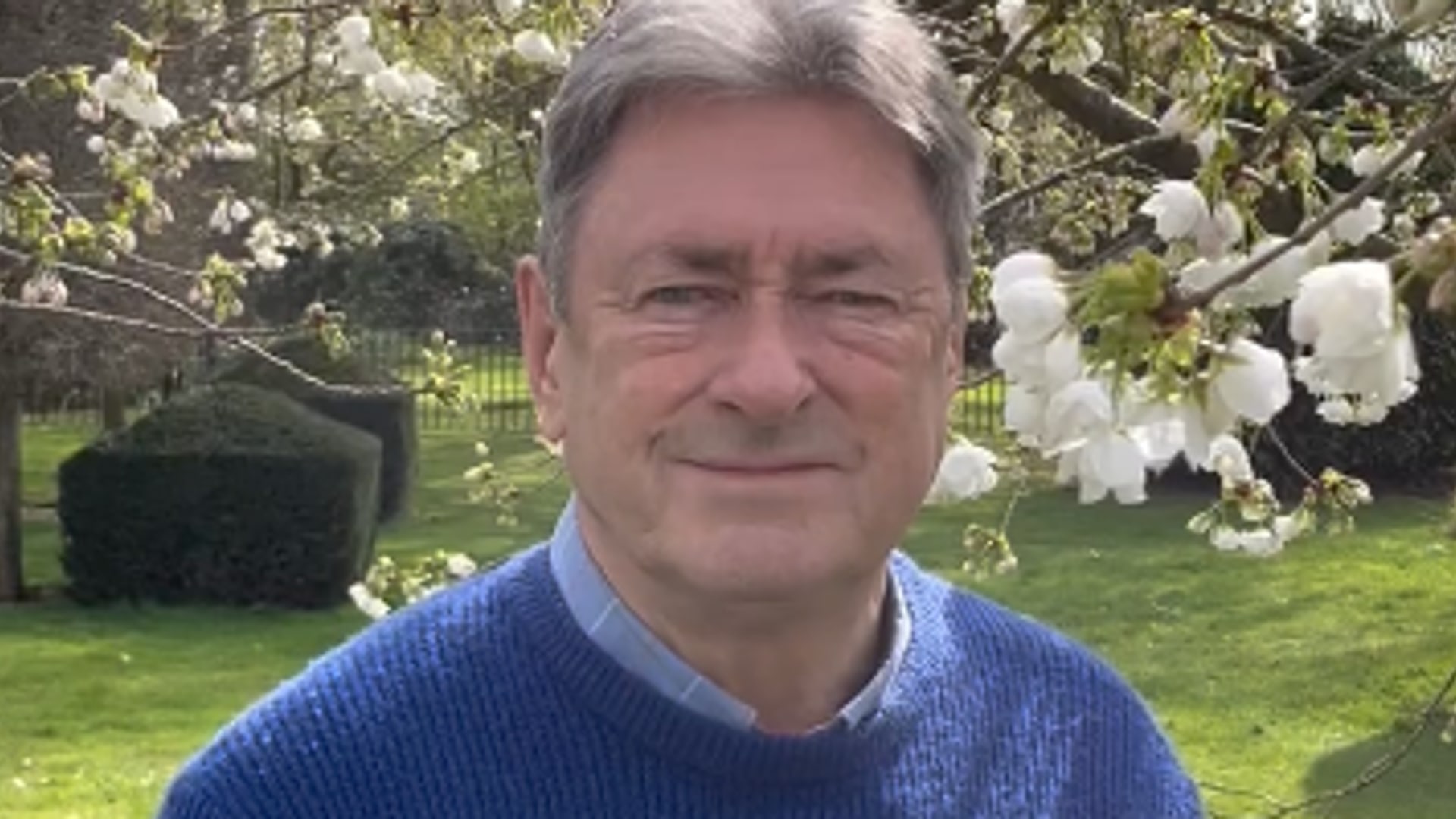 alan titchmarsh in blue jumper in garden