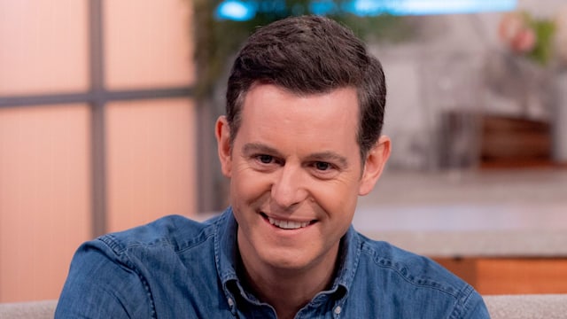 Matt Baker in a blue denim jacket