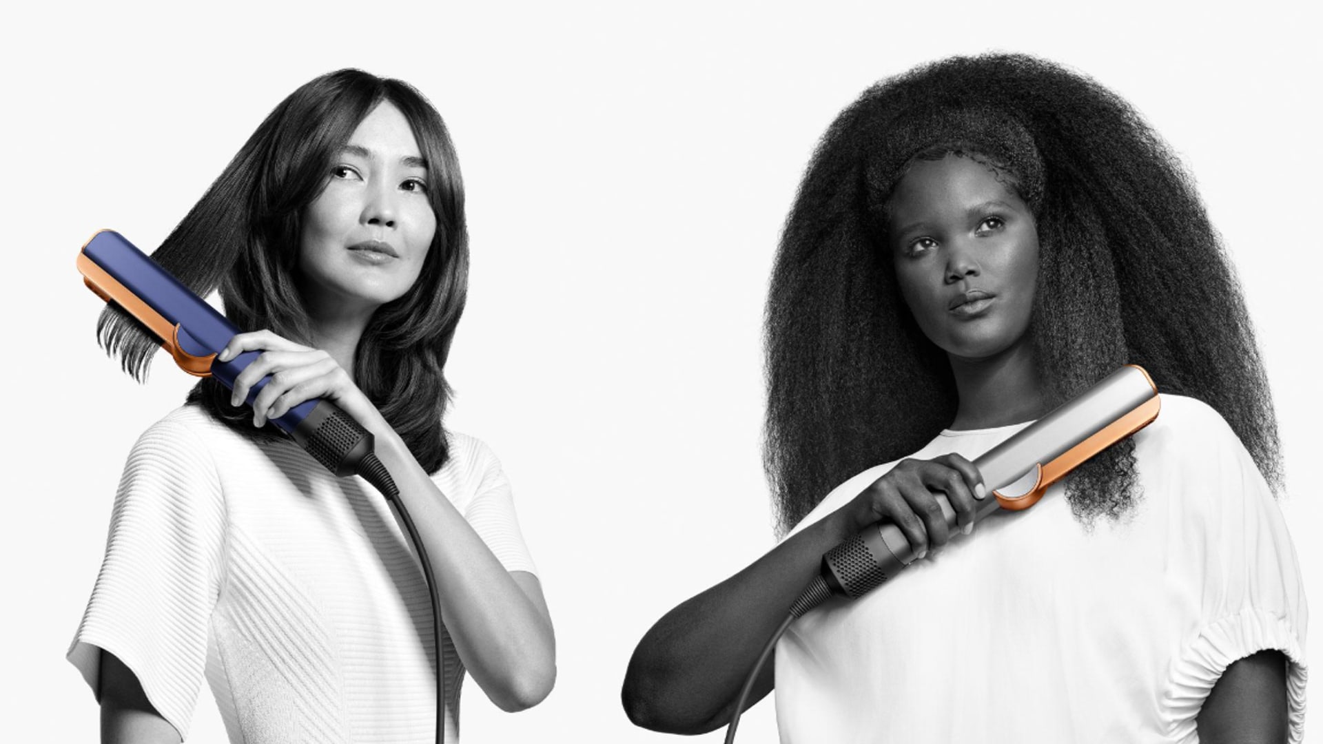 two women using dyson airstrait