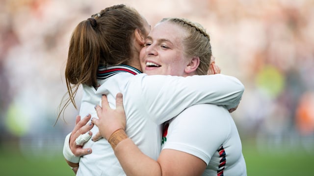 Abi Burton of England hugs teammate following the Guinness Women's Six Nations 2025 match between England and France