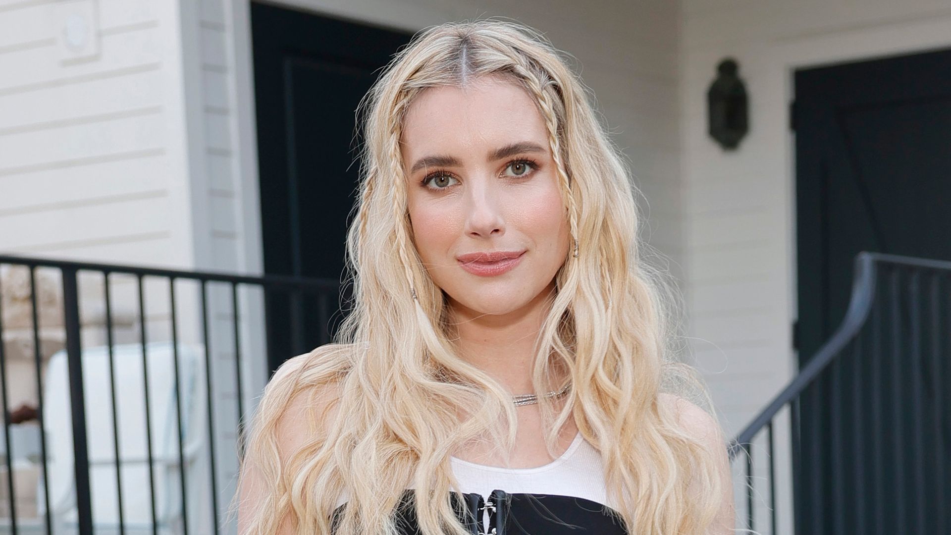 Emma Roberts donned a corset mini dress for the occasion 
