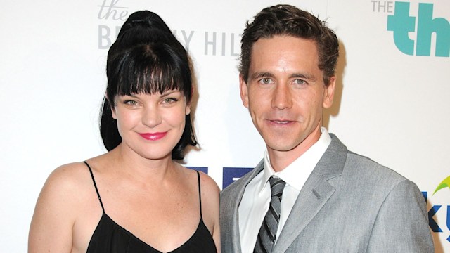 Brian Dietzen and Pauley Perrette pose on the red carpet in 2013