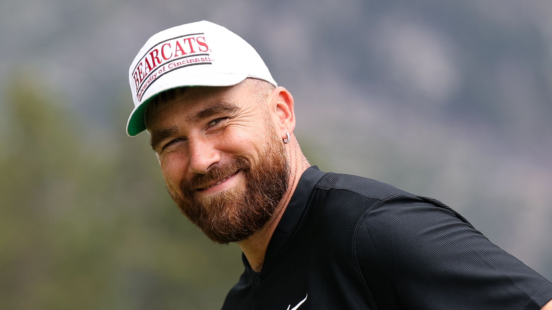 NFL football player Travis Kelce smiles at the 18th hole on day three of the 2024 American Century Championship at Edgewood Tahoe Golf Course on July 14, 2024 in Stateline, Nevada.