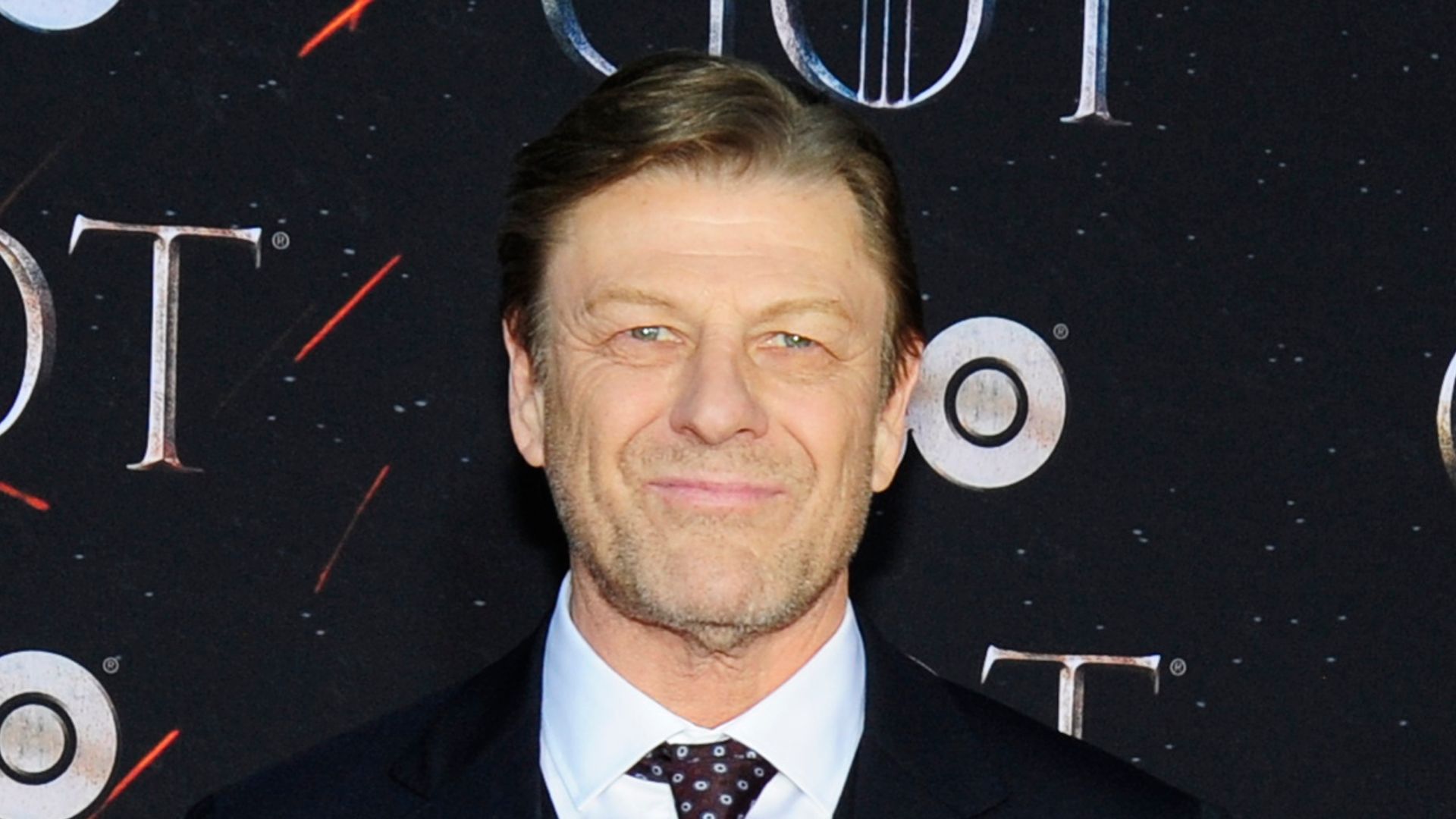 Sean Bean in a black suit