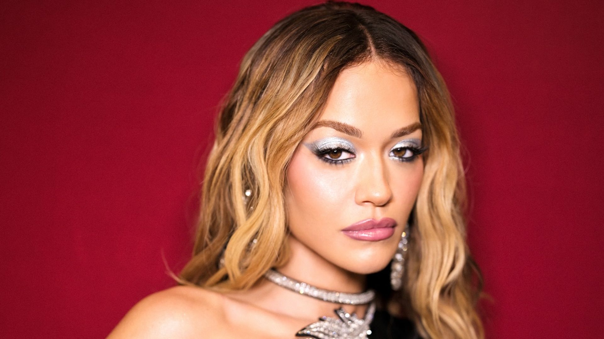 Rita Ora's dazzling crystal-encrusted gown is perfect for party season