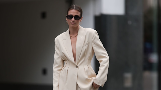 Marie Danker rocks a cream blazer with an hourglass silhouette 