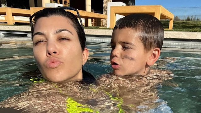 Kourtney Kardashian and her son Reign take selfies while playing in the pool