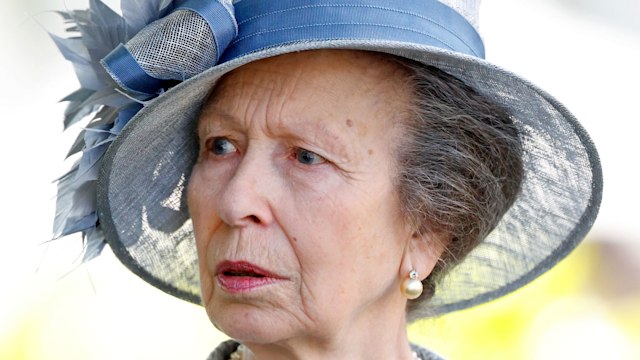 woman in blue hat and occasionwear