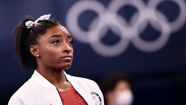 USA's Simone Biles looks on during the artistic gymnastics women's team final during the Tokyo 2020 Olympic Games at the Ariake Gymnastics Centre in Tokyo on July 27, 2021.