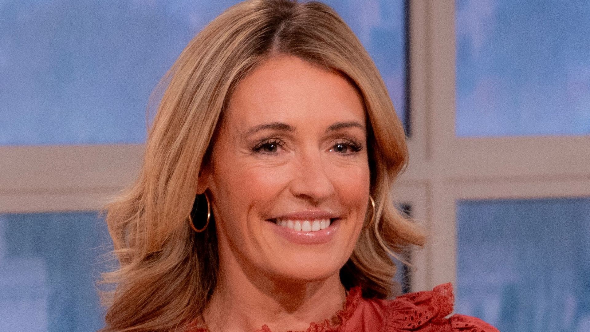 cat deeley in red blouse on this morning 