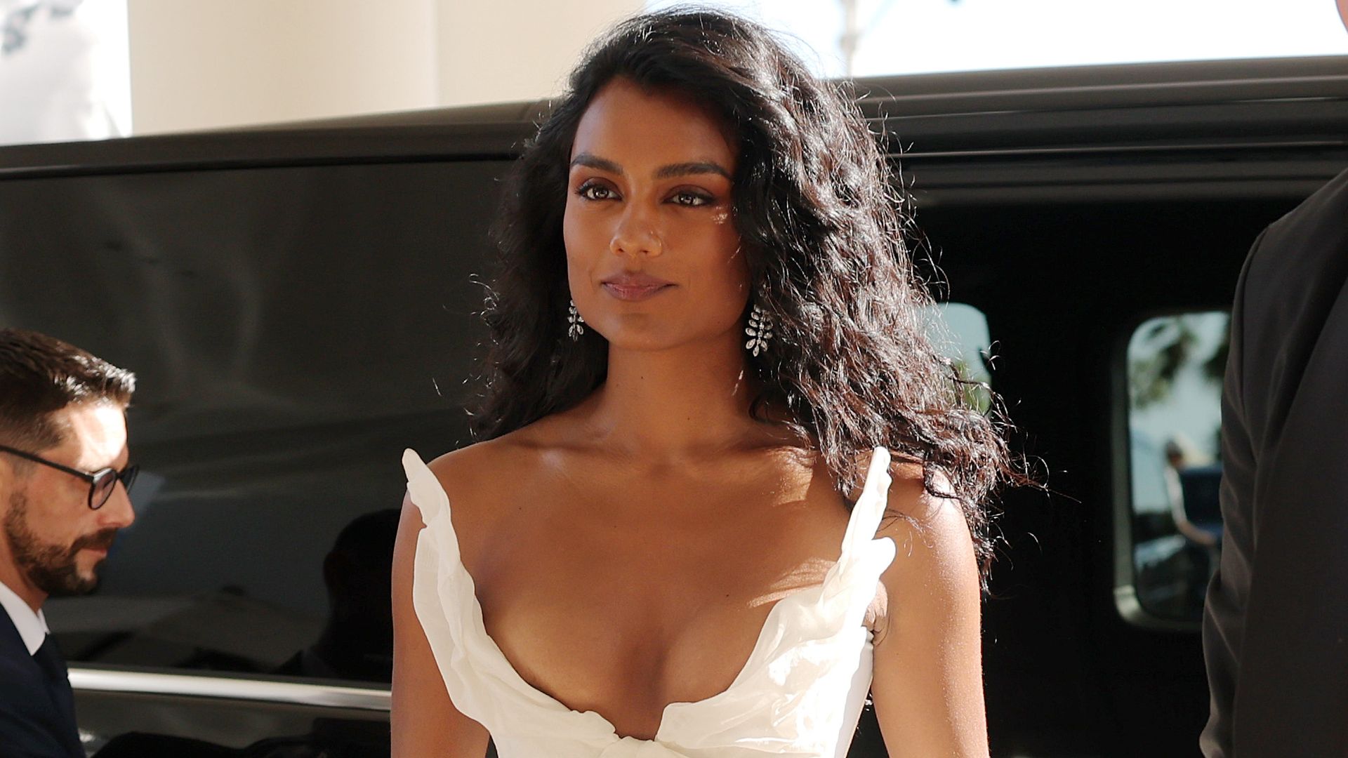 Simone Ashley is seen at Hotel Martinez in a white gown