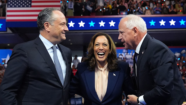 Second gentleman Doug Emhoff, Democratic presidential candidate, U.S. Vice President Kamala Harris, Democratic vice presidential candidate Minnesota Gov. Tim Walz and his wife Gwen Walz talk on stage during a campaign rally at the Liacouras Center at Temple University on August 6, 2024 in Philadelphia, Pennsylvania. Harris ended weeks of speculation about who her running mate would be, selecting the 60 year old midwestern governor over other candidates