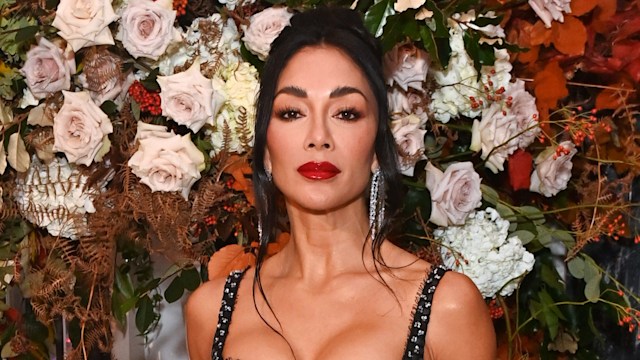 nicole scherzinger in black dress at evening standard awards 