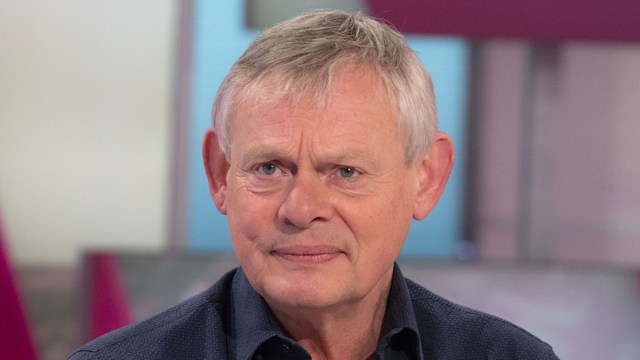 actor sitting in tv studio