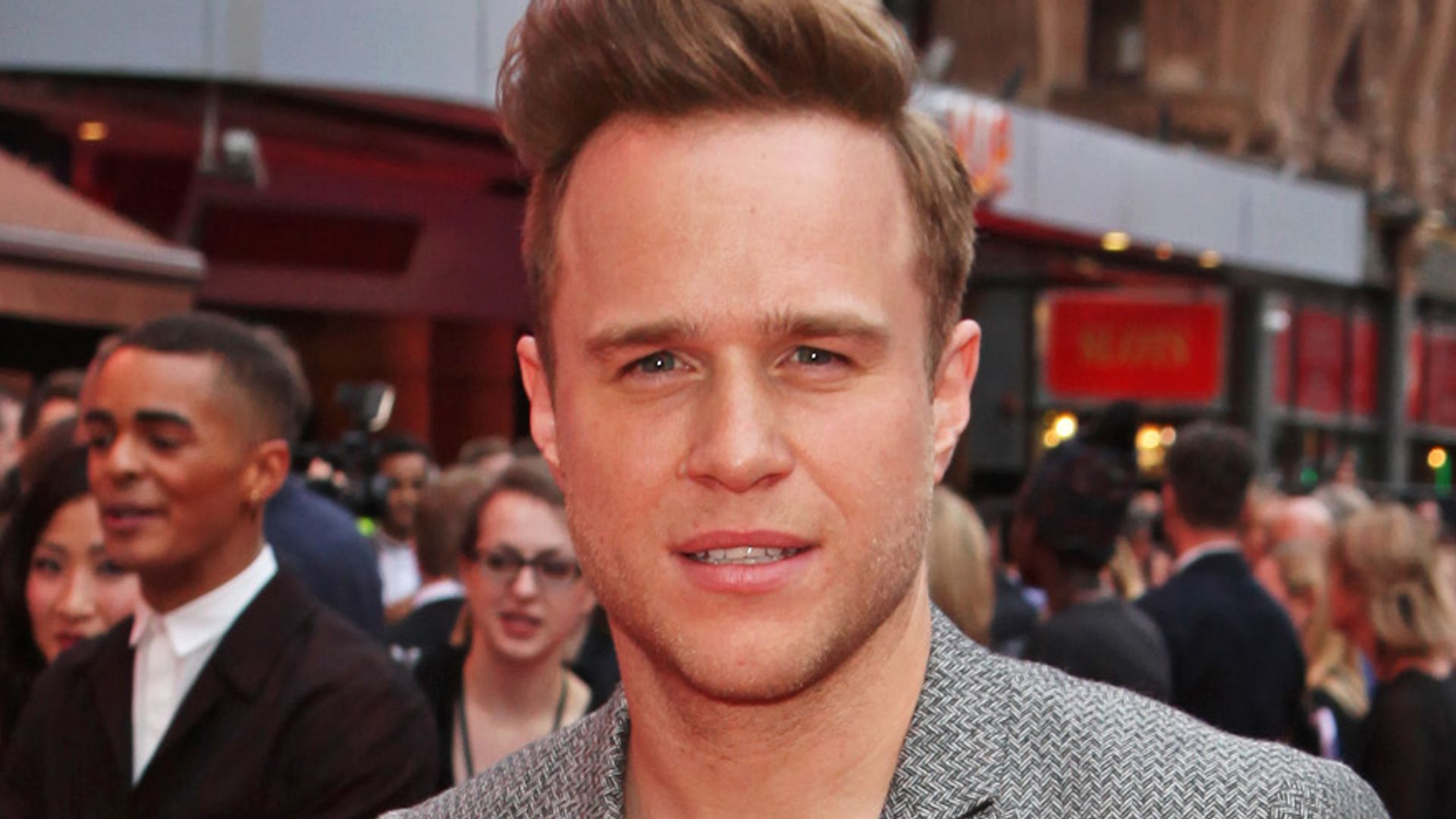 Olly Murs in a grey suit on the red carpet