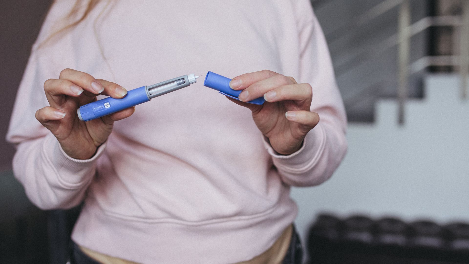 Semaglutide pen preparation for injection therapy captured in detail. The image depicts a medical device essential for individuals managing weight loss or type 2 diabetes.