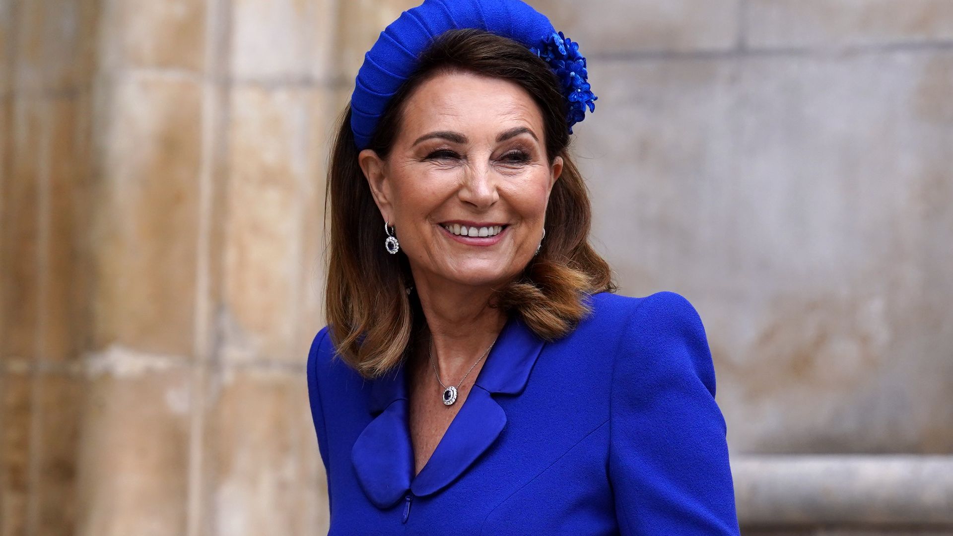 Carole Middleton wows in lace for surprise royal wedding appearance