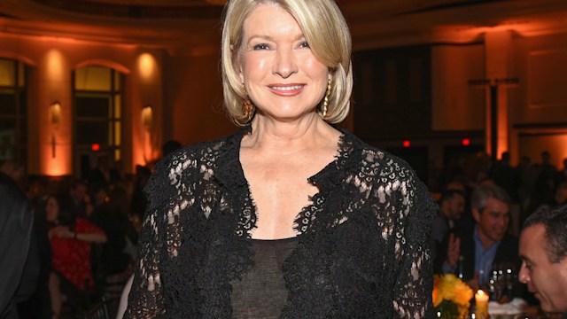 Martha Stewart with glowing skin wearing black lace