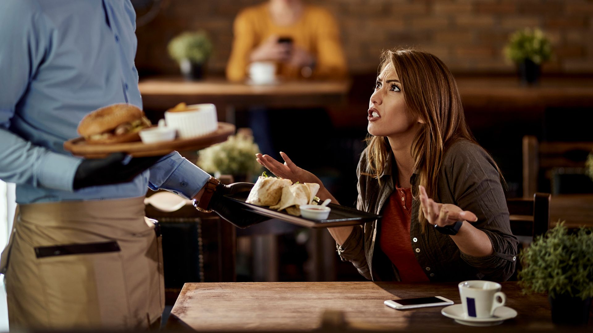 woman complaining at restaurant