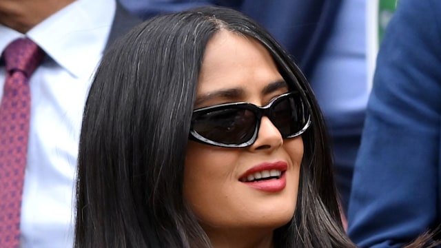 salma hayek in sunglasses watching tennis