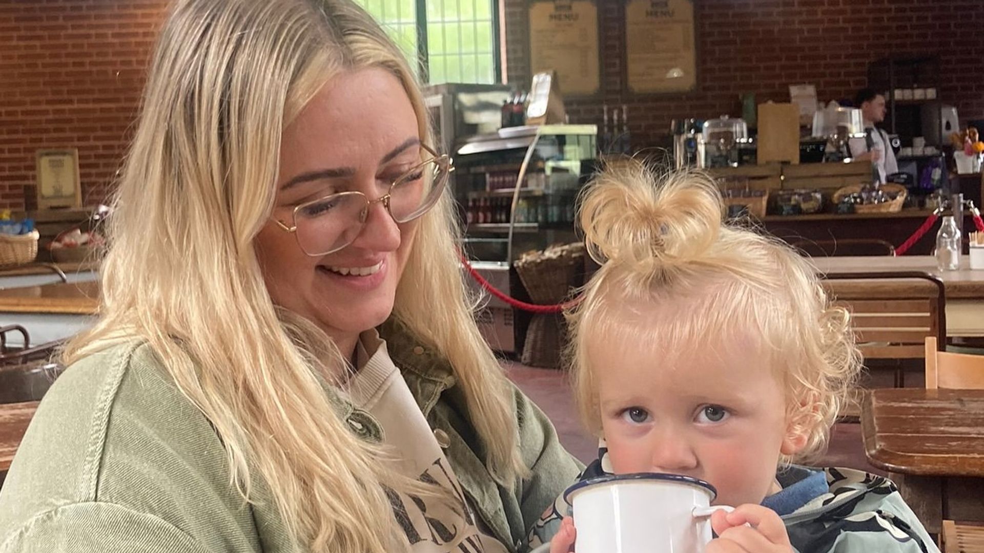 mother with son in cafe