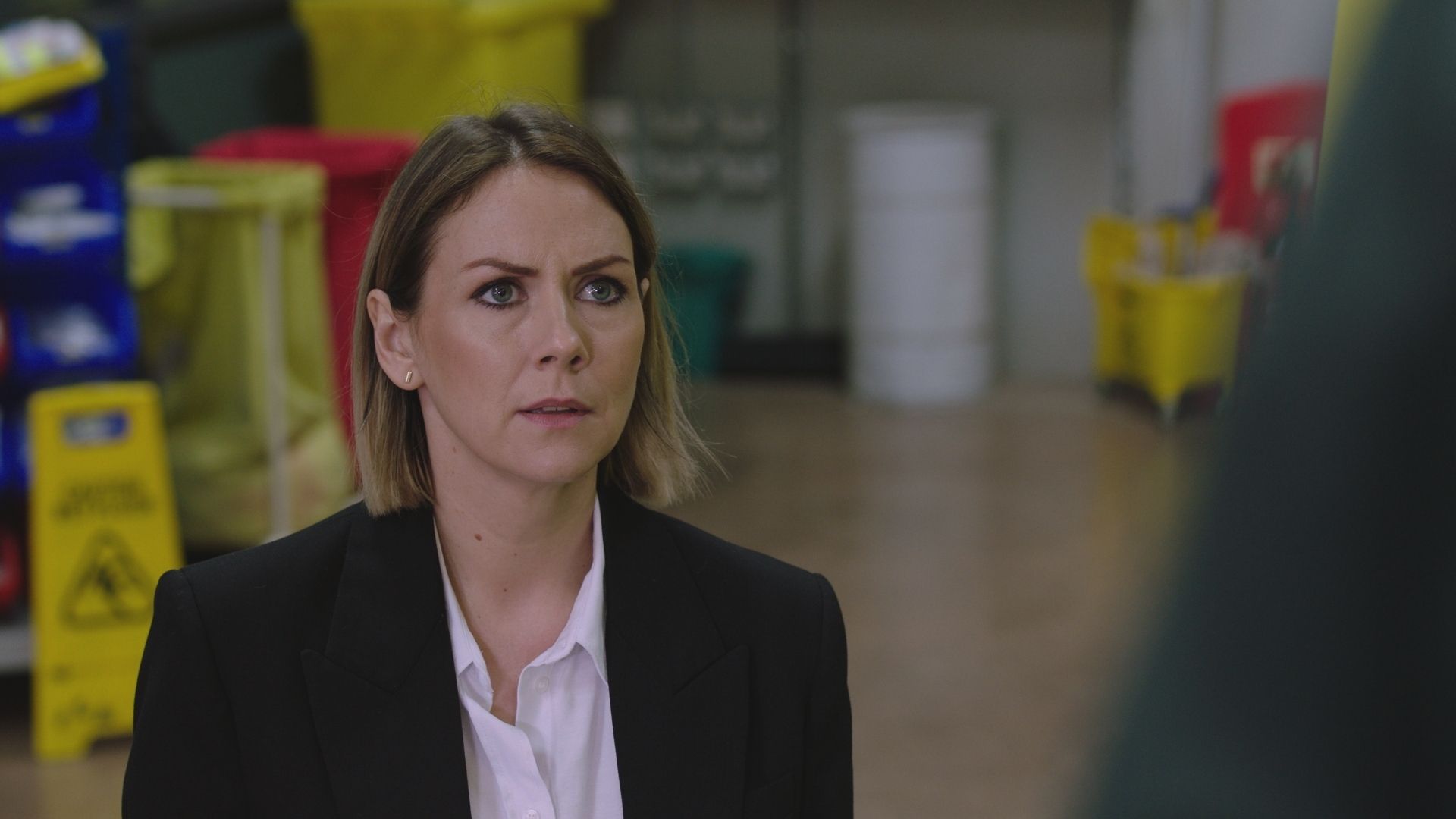 Elinor Lawless in a black suit in Casualty