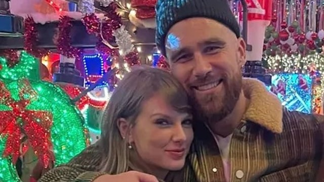 Taylor Swift and Travis Kelce hugging