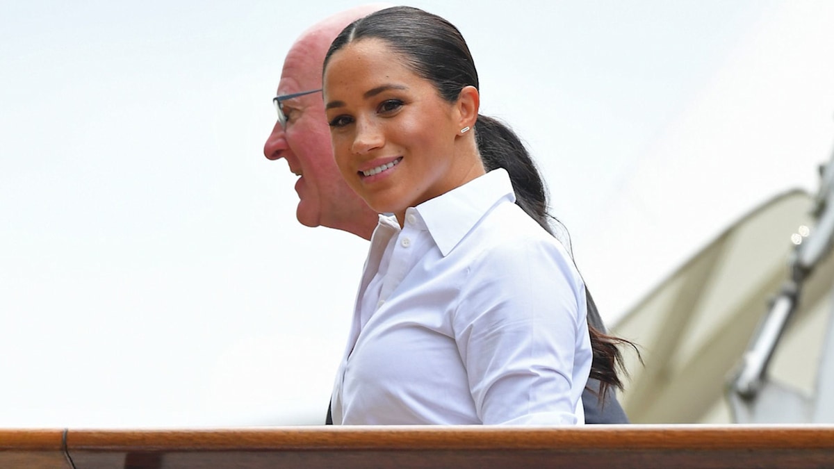 Wimbledon whites! Duchess Meghan stuns in statement skirt for tennis ...