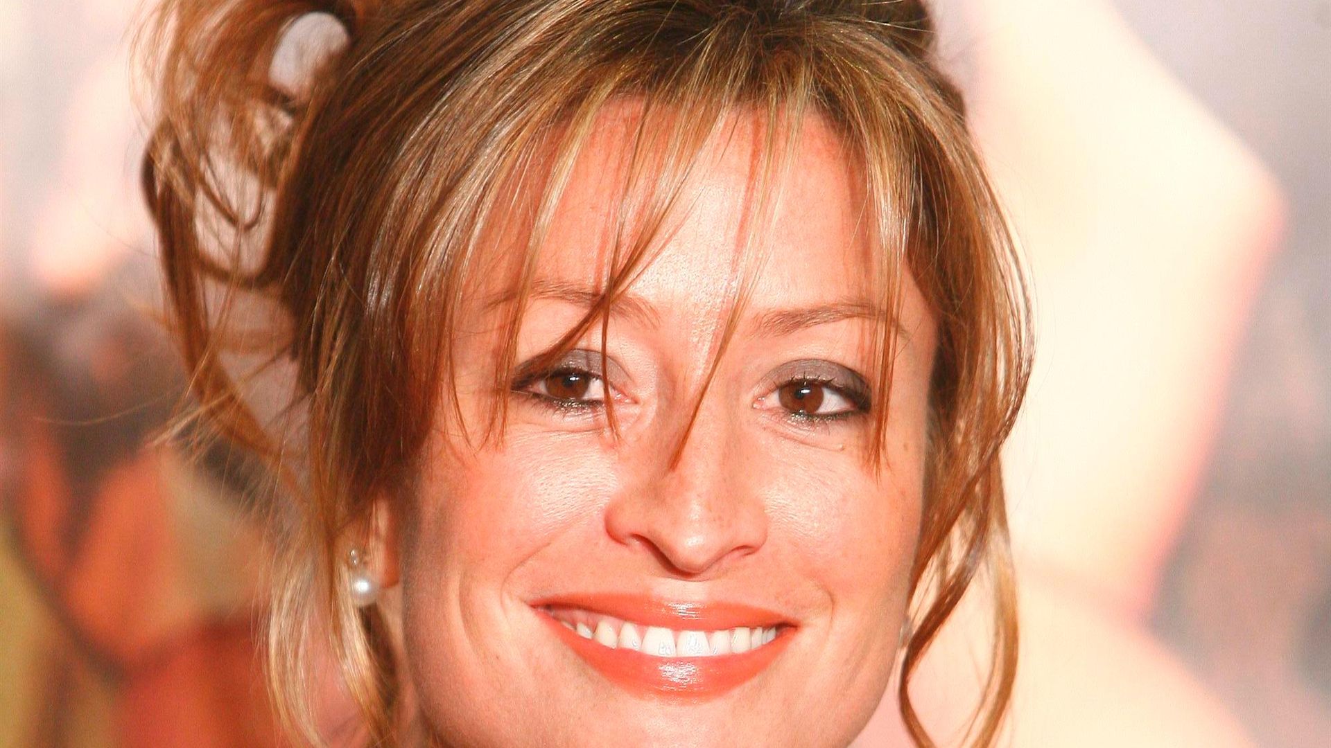 Rebecca Loos wearing a black dress